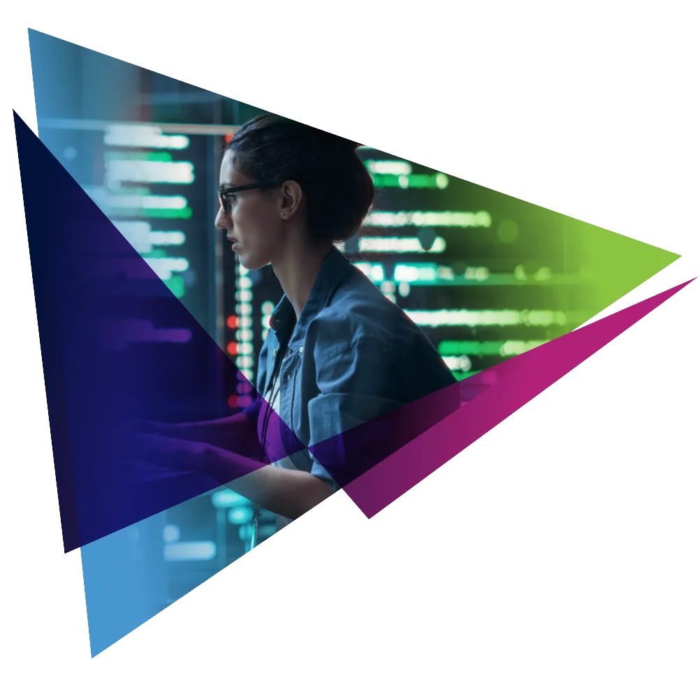 Person coding at computer with colorful geometric overlay, showcasing technology and innovation.