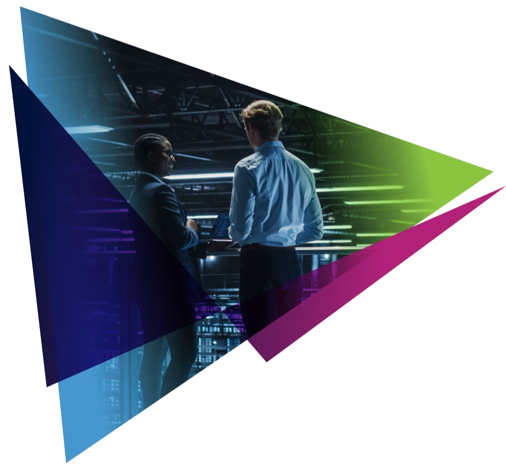 Two professionals discussing data management in a modern server room with colorful geometric overlay.