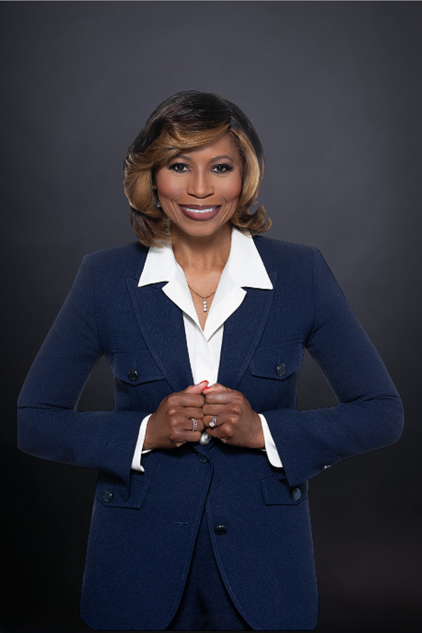 Headshot of a black business woman in a bright red dress